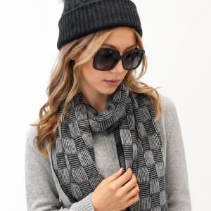 Cashmere & Merino Winter Hat and Scarf Set Elevate your cold-weather wardrobe with this elegant Cashmere & Merino hat and scarf set. Crafted from a luxurious blend of premium cashmere and fine merino wool, it offers exceptional softness, warmth, and comfort without added bulk. The cable-knit beanie features a stylish faux-fur pom-pom, adding a sophisticated touch to your winter look, while the geometric patterned scarf provides both warmth and timeless style. Designed in versatile charcoal and grey tones, this coordinated set pairs effortlessly with both casual and smart-casual outfits. Features: Premium cashmere and merino wool blend Soft, lightweight, and naturally breathable Cable-knit beanie with elegant pom-pom detail Matching geometric-pattern scarf Excellent warmth and comfort for cold-weather wear Timeless neutral colours for versatile styling Perfect for everyday wear, travel, or as a thoughtful winter gift, this luxurious set combines style, comfort, and practicality for the season ahead.